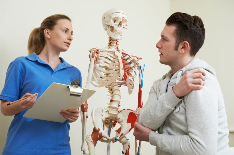 Image about client discussing with osteopath